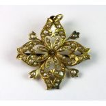 An Edwardian yellow metal (tested 14ct gold) seed pearl set brooch/pendant, L. 3cm (some seed pearls
