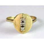 An interesting 9ct yellow gold diamond set ring (O.5).