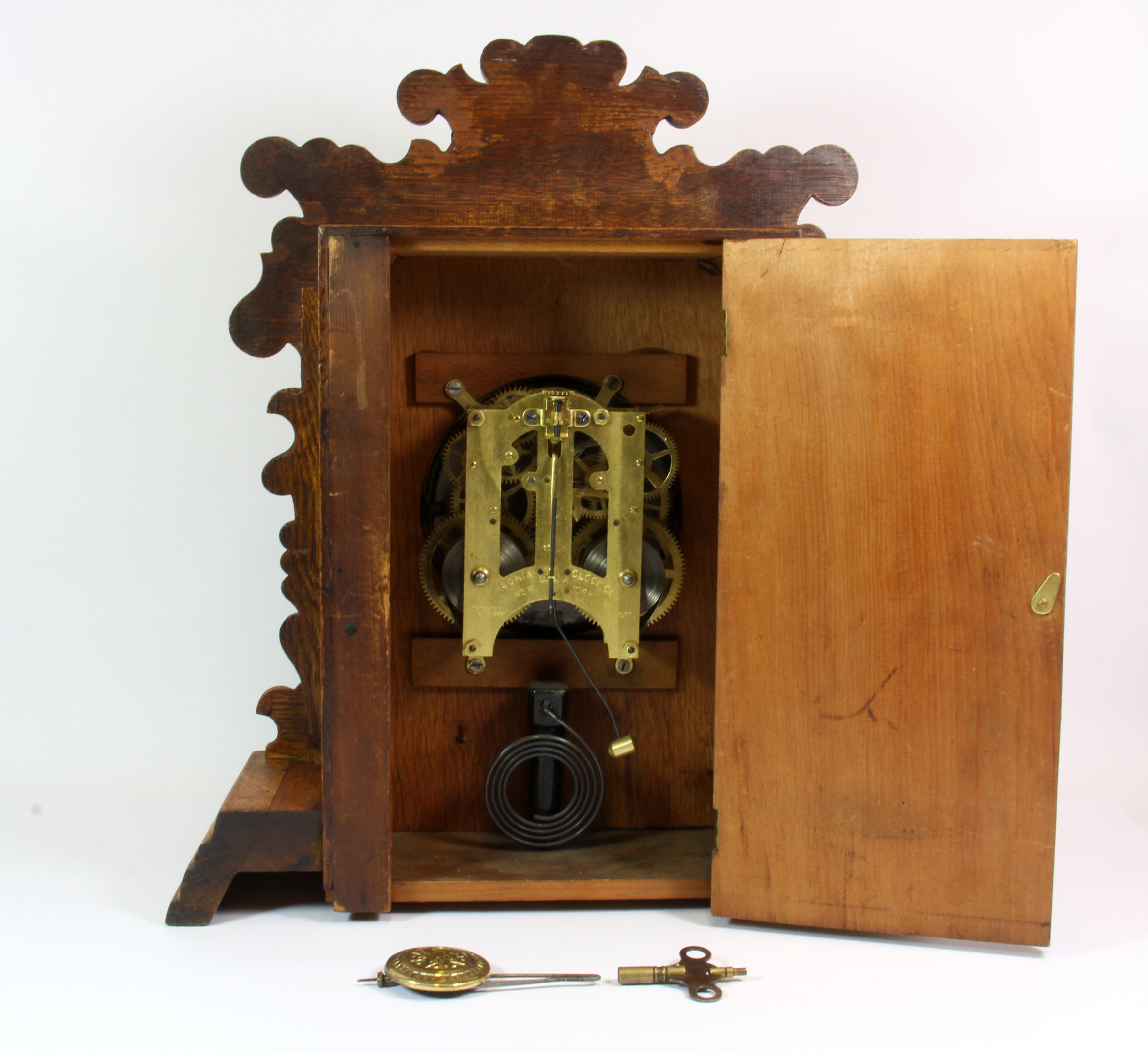 A 19th century oak mantle clock, H. 41cm, understood to be in working order. - Image 2 of 3