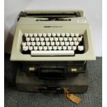 Three vintage typewriters.