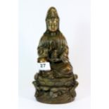 A Chinese bronze figure of the seated Guanyin, H. 25cm.