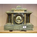 A 19thC French gilt and green onyx mantle clock, H. 30cm, understood to be in working order.