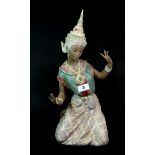 A large Lladro pottery figure of a Thai dancer, H. 43cm.