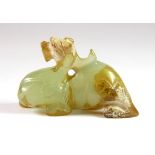 A Chinese carved archaic form jade figure of a dragon, 7 x 4 x 2.5cm.