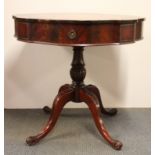 A mahogany leather inset drum table, Dia. 75cm H. 81cm.