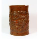 A mid 20th century Chinese carved bamboo brush pot, H. 18cm.