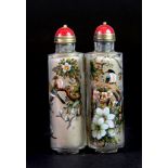 A well painted double Chinese inside painted snuff bottle with gilt and red hardstone stoppers, H.