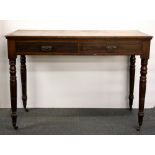 A mahogany two drawer desk, W. 107cm.