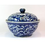 A hand painted 19th/early 20th century Chinese porcelain prunus pattern bowl and cover, H. 21cm,