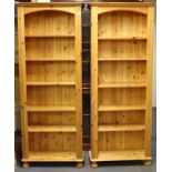 A pair of pine open bookcases, 75cm x 187cm.