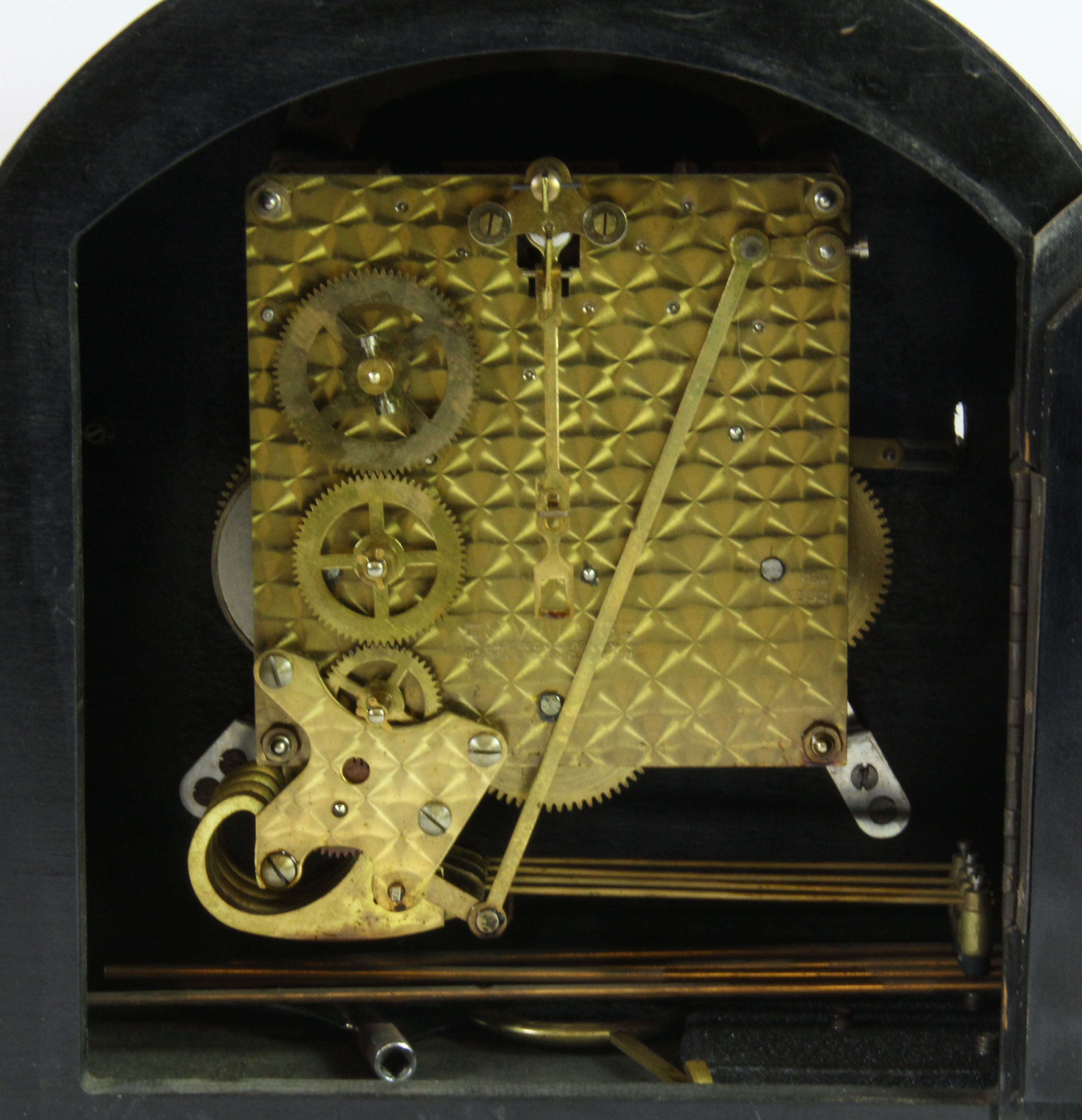 A 1930's chiming oak mantle clock, H. 23cm. - Image 2 of 4