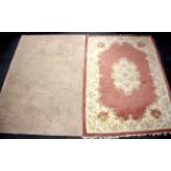 Two Chinese washed wool rugs.