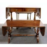 A Regency style mahogany sofa table, W. 83cm, together with a matching coffee table and a nest of