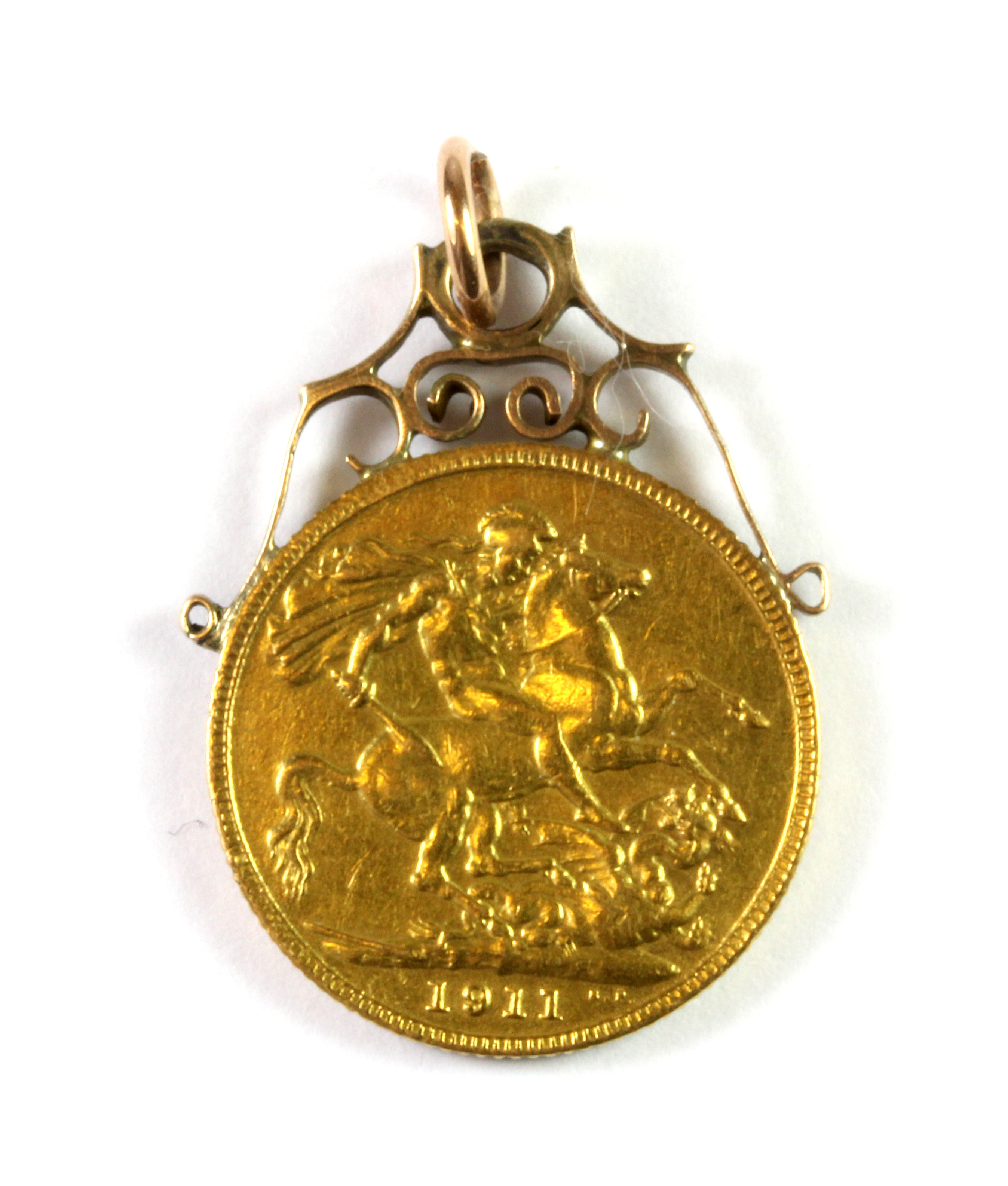 A yellow metal (tested minimum 9ct gold) mounted George V 1911 full sovereign set as a pendant.