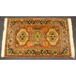 An attractive wool rug, 150 x 90cm.