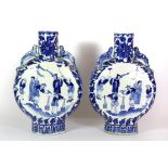 A pair of 18th / early 19th century Straits Chinese porcelain moon vases with dragon handles and