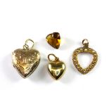 Three 9ct yellow gold heart shaped pendants (approx. 4.6gr).