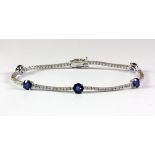 A very pretty 18ct white gold (stamped 750) bracelet set with bright sapphires (2.25ct) and