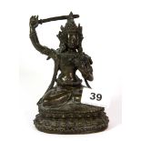 A 19th / early 20th century Tibetan bronze figure of a seated Tara, H. 15cm.