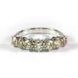 An 18ct white gold (stamped 750) seven stone diamond ring (total approx. 1.61ct)(O).