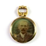 A Victorian 9ct yellow gold mounted portrait pendant.