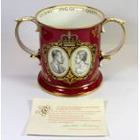 A boxed Spode limited edition commemorative loving mug 438 / 500, together with a boxed Paragon