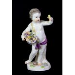 A 19th century Meissen porcelain figure of a cherub with flowers, H. 13.5cm.