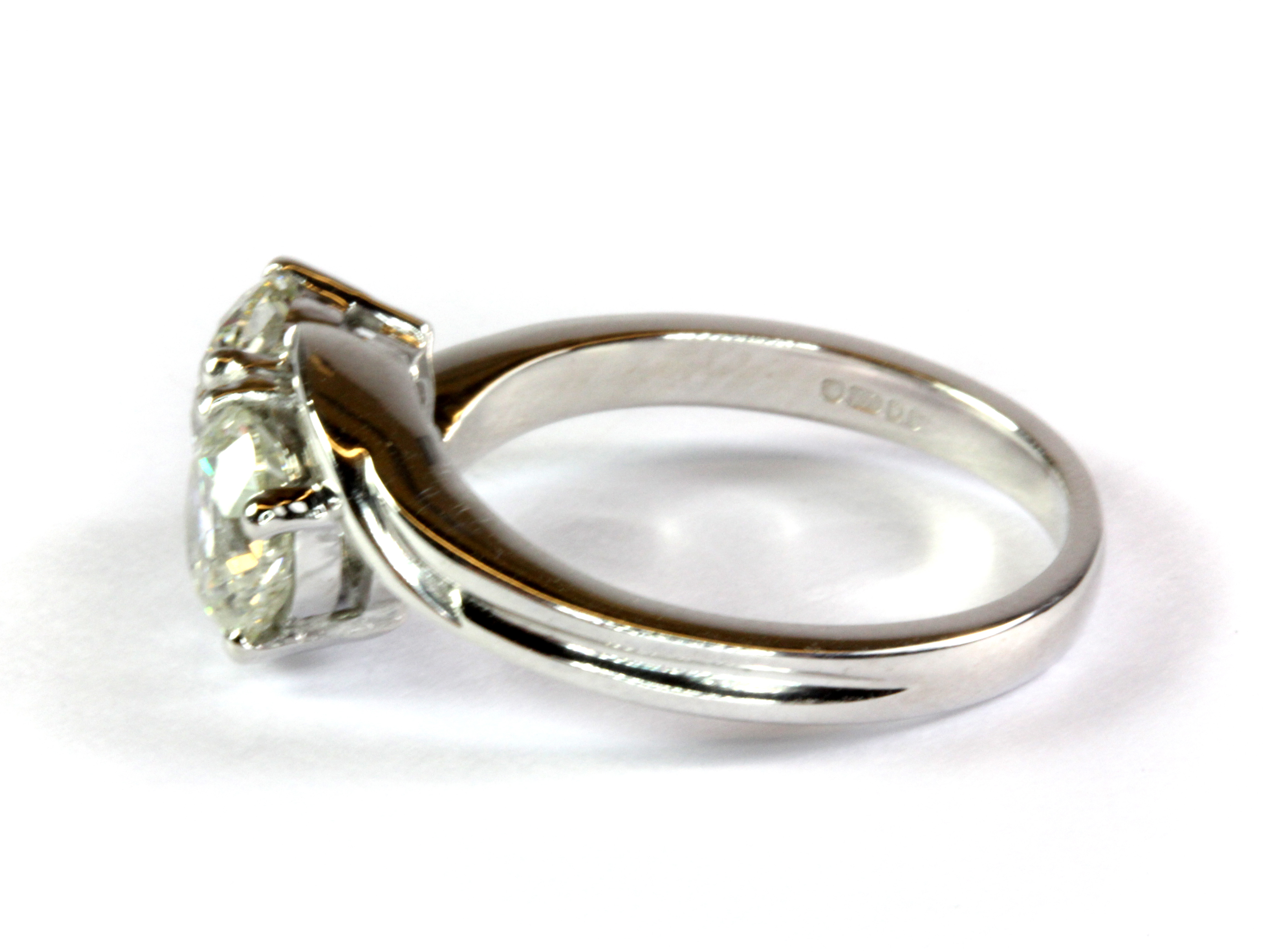 An impressive 18ct white gold (fully hallmarked) ring set with two diamonds in a crossover - Image 2 of 2