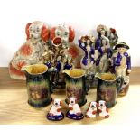 A quantity of reproduction Staffordshire dogs, figures and jugs.