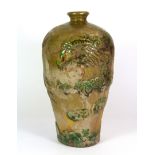 A Chinese green glazed pottery Mai Ping shaped vase with relief decoration of a dragon, H. 25cm.