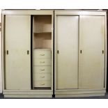 A pair of vintage painted sliding door wardrobes, W. 100cm, H. 180cm.