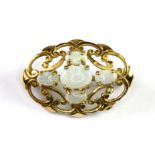 A 9ct yellow gold (stamped 375) opal set brooch, L. 2.5cm.