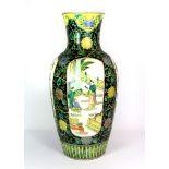 A 19th / early 20th century Chinese famille verte decorated porcelain vase with four panel