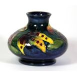 An early Moorcroft tube lined Orchid pattern vase, H. 7cm