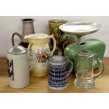 Three German steins, three ceramic items and a vintage kitchen scale.