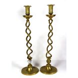 A pair of tall brass open barley twist candle sticks, H. 48cm.