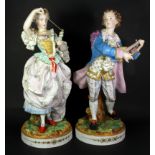 A pair of large 19th century French bisque porcelain figures, H. 39cm.