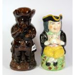 Two 19th century Staffordshire pottery Toby character jugs, H. 23 & 24cm.