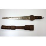 An eastern sword with decorated steel blade and embossed leather hilt and scabbard, L. 61cm.