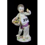 A 19th century Meissen porcelain figure of a cherub with flowers, H. 13.5cm.