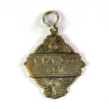 A white metal (tested silver) Tata Cup Winners medal turned into a pendant, c. 1931, L. 4.5cm.