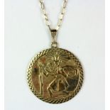 A 9ct yellow gold medal depicting Saint Christopher on a 9ct gold chain (approx. 4.4gr).