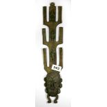 Three mixed tribal items, one bronze / brass, L. 41cm, a wooden figure, H. 22cm, and a soapstone