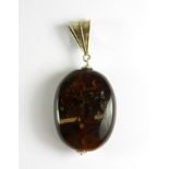 A sterling silver mounted fire agate pendant, L. 5.5cm.