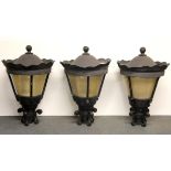 Three large wrought iron and fibre glass street style lamps. H.75cms.