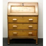 A 1930's golden oak bureau, H. 105cm.