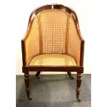 A fine mahogany bergere chair by Simon Horne.