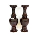 A pair of 19th century Japanese bronze vases, H. 35cms