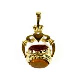 A 9ct yellow gold stone set Claddagh spinning fob.