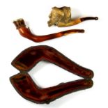 A 19th century metal mounted Meerschaum pipe of a Horses leg (repair to mouth piece), L. 11cms and a